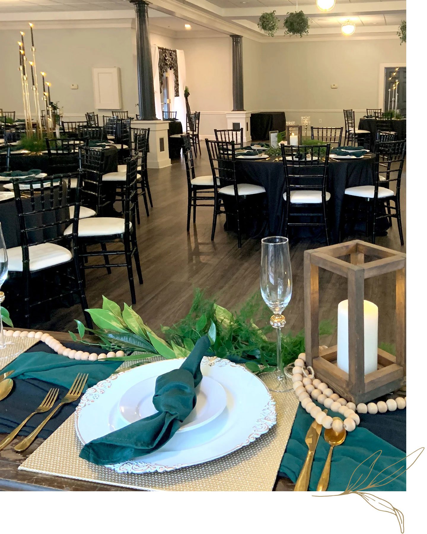 Elegant Table Setting in a Modern Event Space A beautifully set table with green napkins and decor. A modern event space with round tables and black chairs.